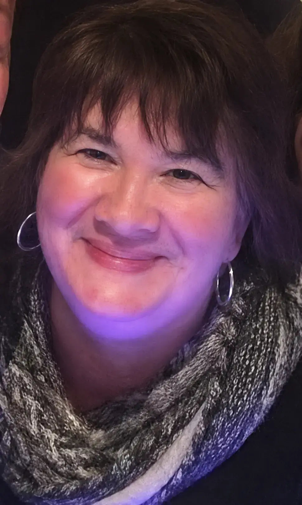 A headshot of the store owner, Chelsea